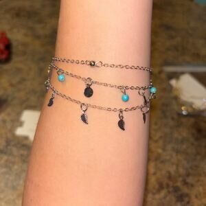 Silver multi layered charm anklets with